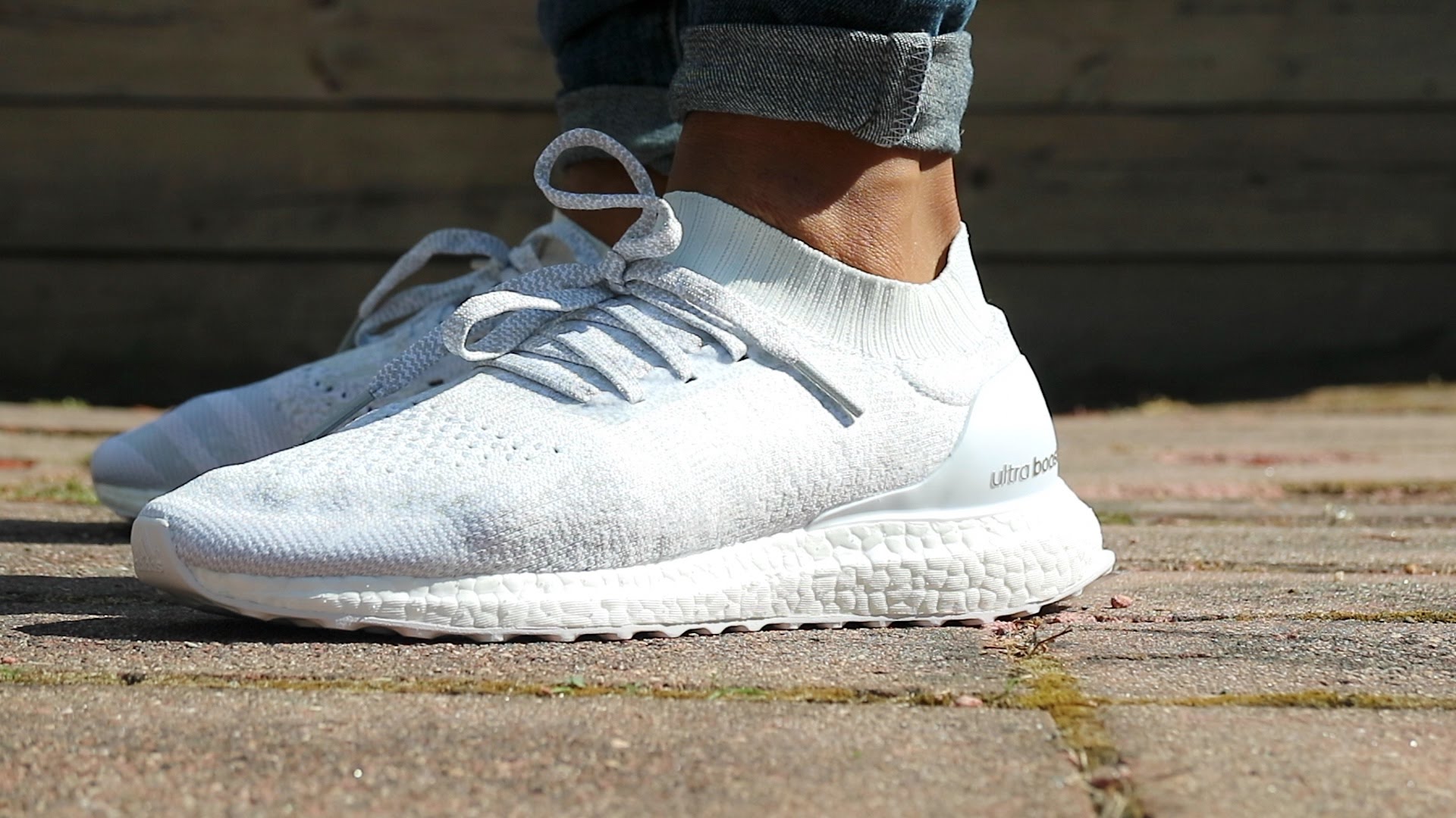 adidas ultra boost uncaged reflective white